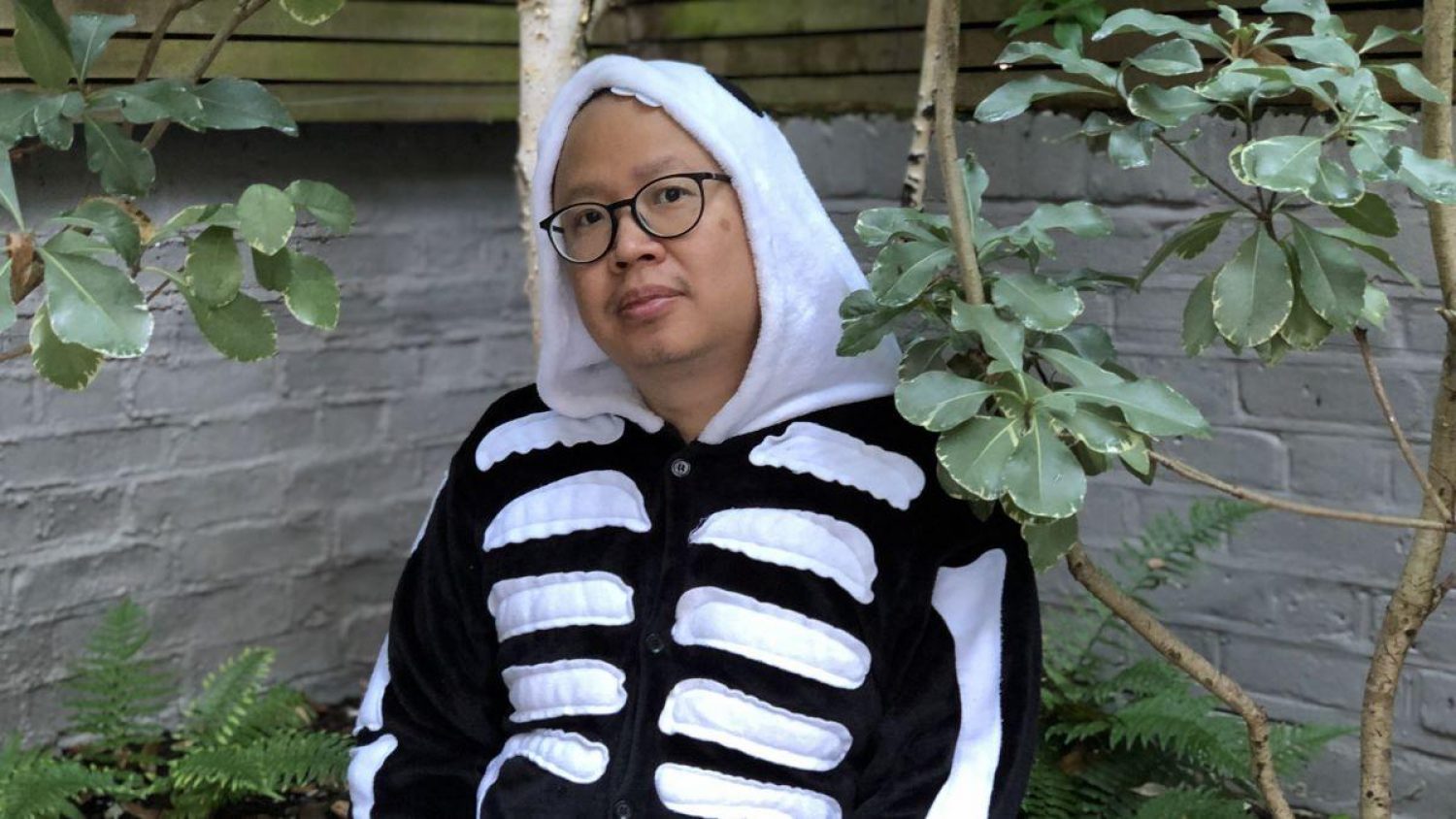 Ben Yeoh, dressed in a skeleton hoodie, promoting new show, Thinking Bigly: How we die
