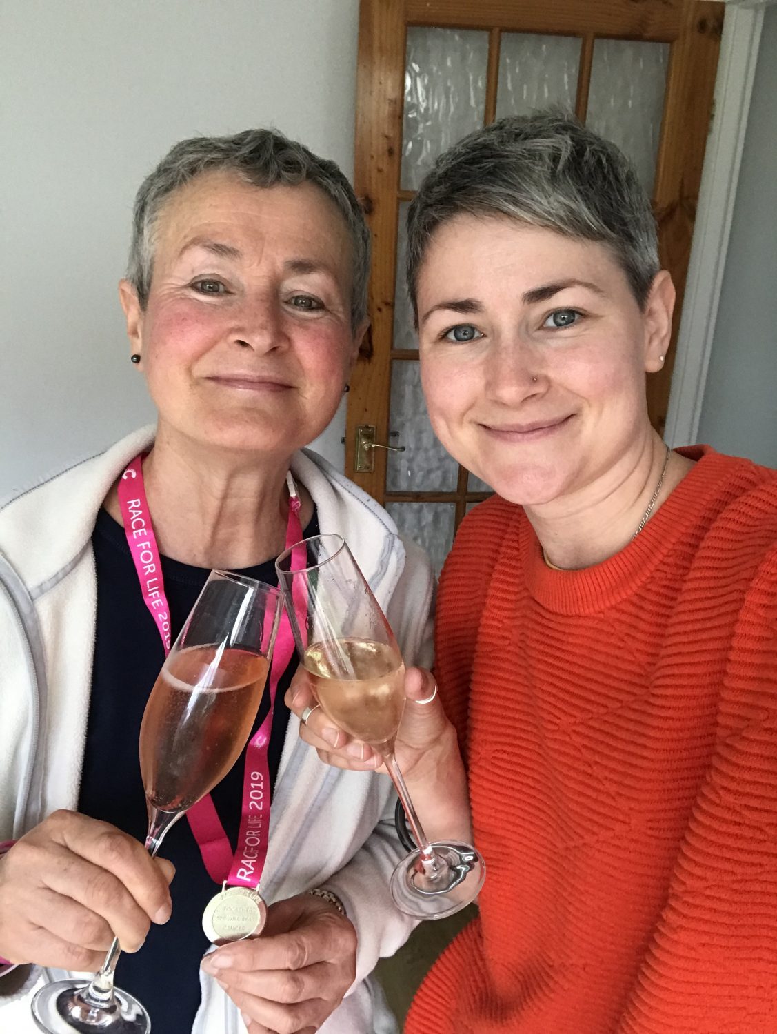 Two women smiling: Poppy's funeral director Amy Szott and her mum Joy