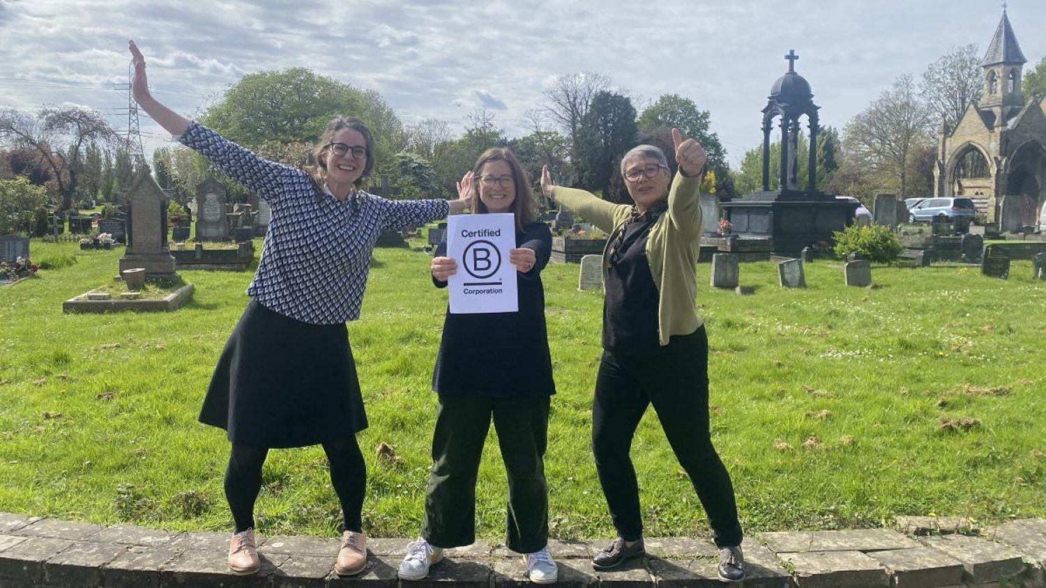 Poppy's team celebrating our B Corp Certification in Lambeth Cemetery