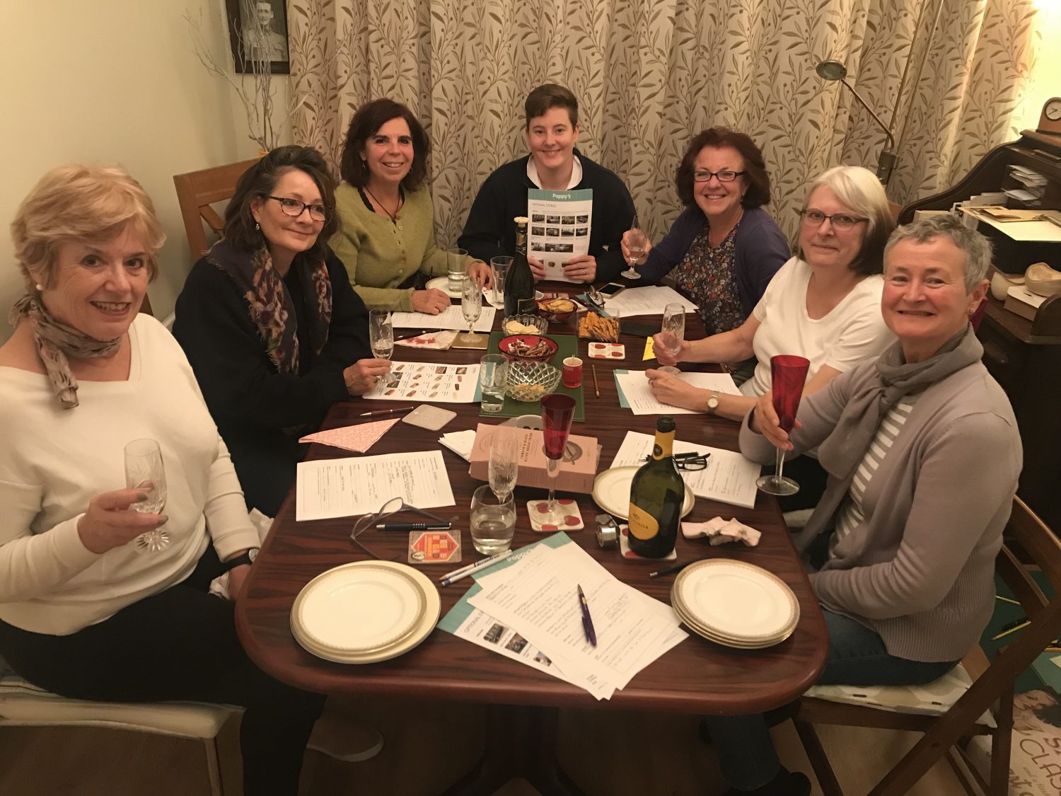 A group of women sitting at a table.