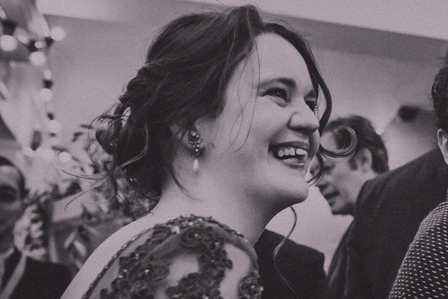 Young woman dressed smartly in black and white photo, funeral stories, Poppy's