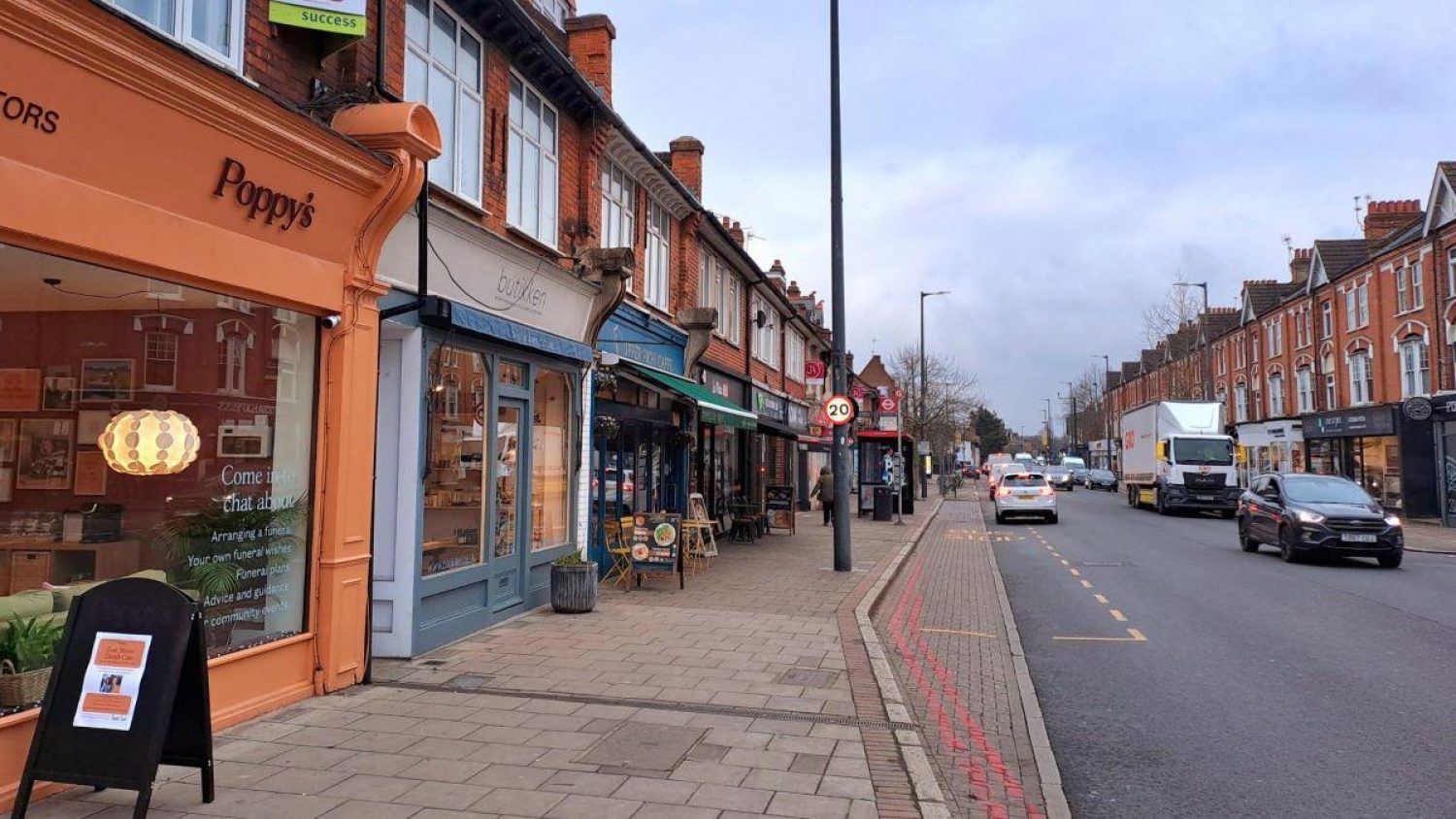 Upper Richmond Road West, road and shopfronts