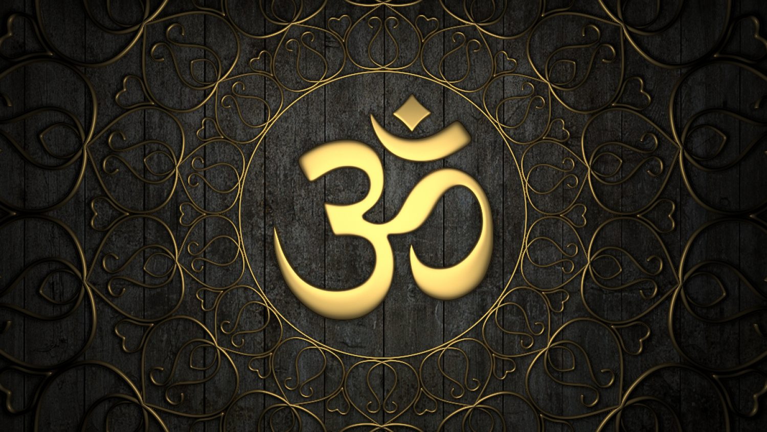 Hindu symbol in gold on dark background