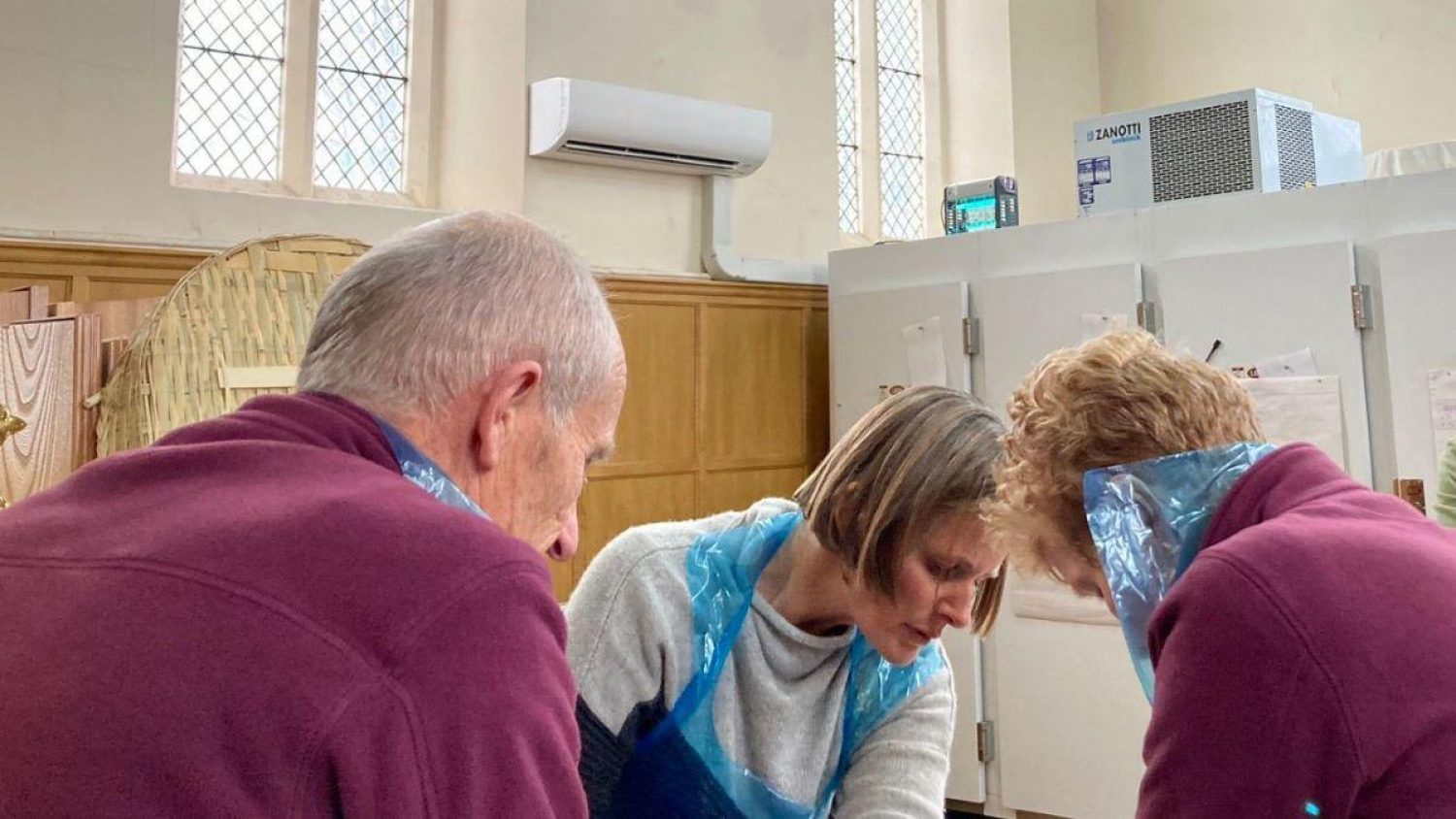 Three members of Poppy's team in Poppy's mortuary