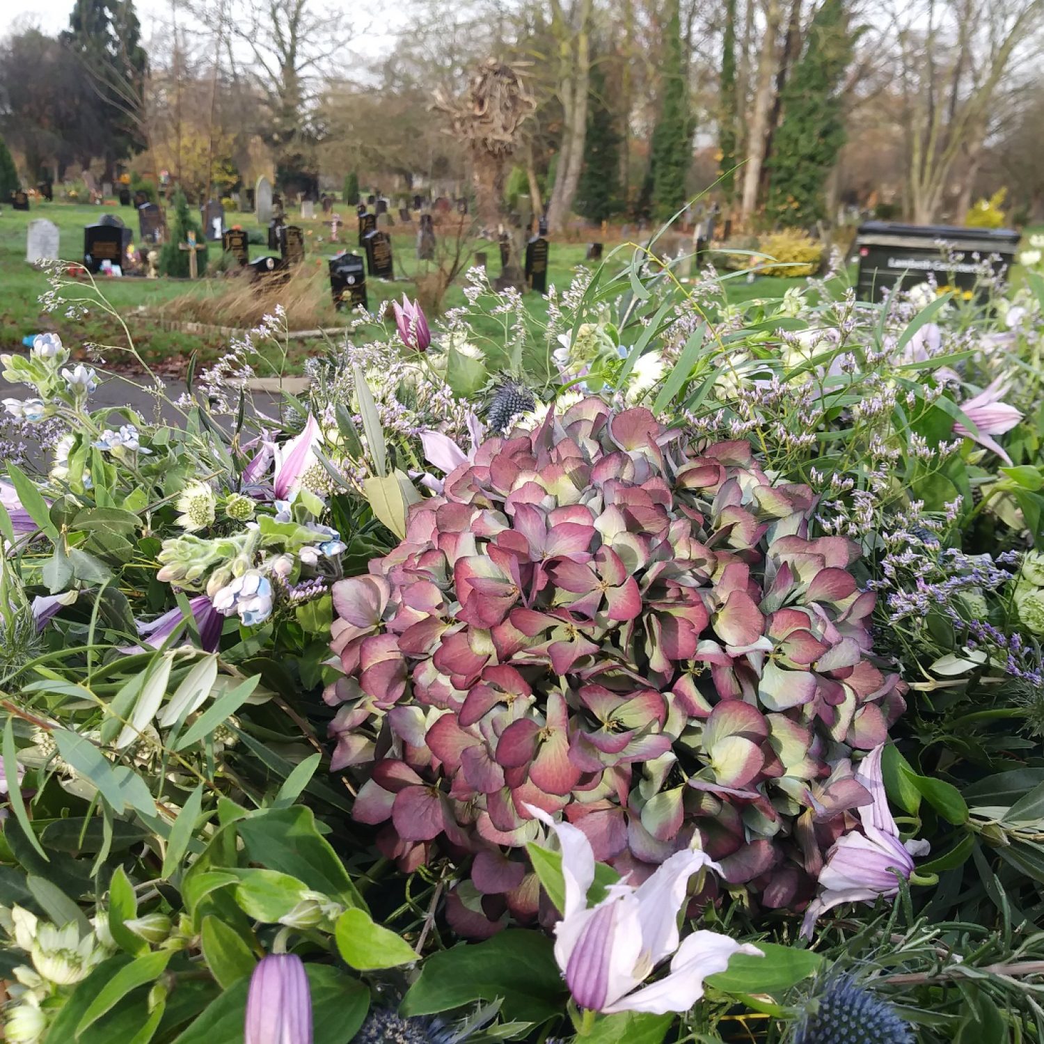 Flowers on a coffin, Poppy's, London funeral directors