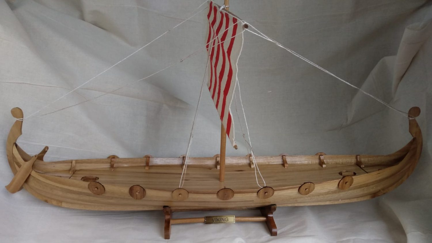 urn for ashes shaped like viking long boat