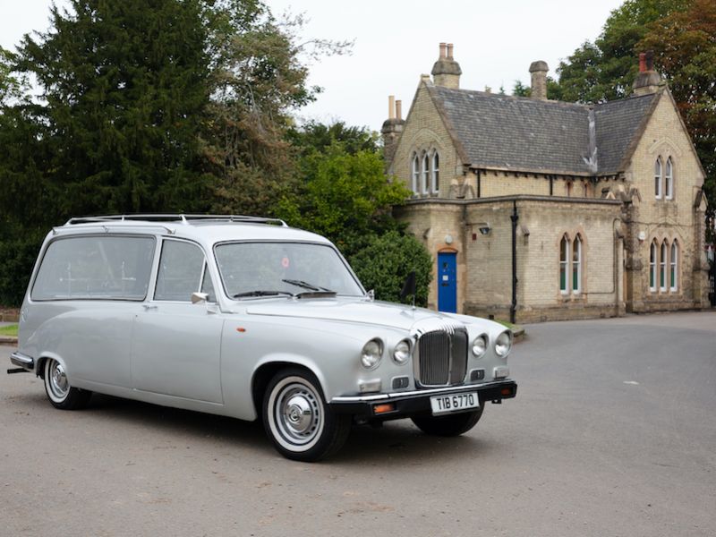 vintage silver Daimler hearse