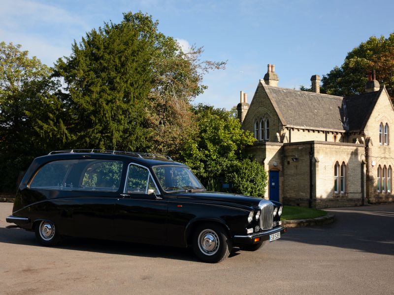 VINTAGE BLACK DAIMLER HEARSE