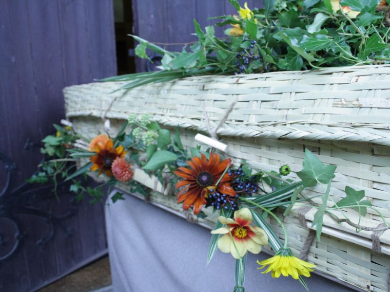 Coffin with garland