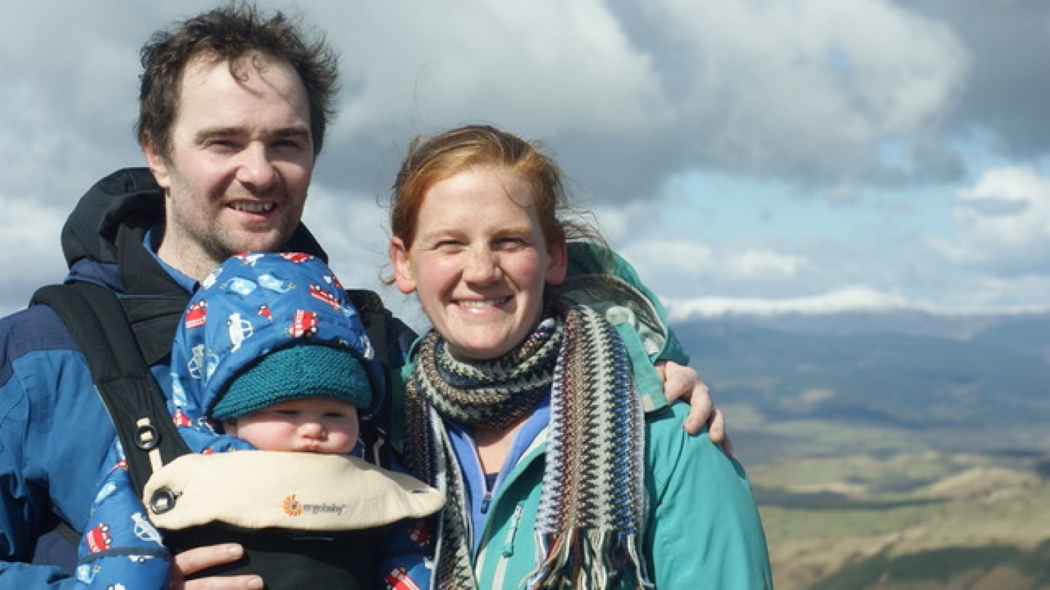 Gemma and Will and their baby on a hill walk | Poppy's funerals | London funeral directors